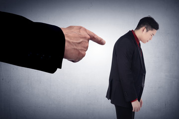 Concept of accused businessman with with fingers pointing