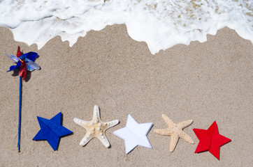 Fototapeta na wymiar Patriotic USA background with starfishes