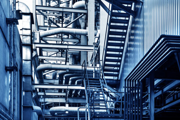 Fototapeta premium Closeup of manometer, pipes and faucet valves of heating system in a boiler room