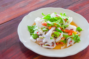 Thai style salad seafood on the wood table