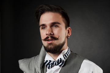 handsome guy with beard and mustache in suit