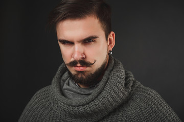handsome guy with beard in wool pullover