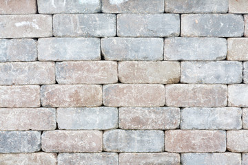 Background texture of a tumbled brick wall