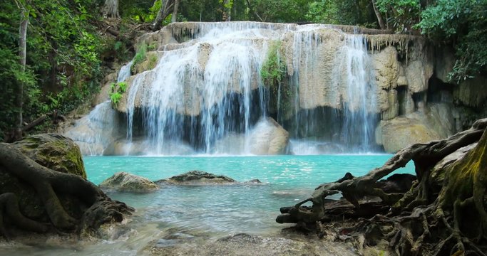 Erawan waterfall in Thailand. Idyllic tropical paradise nature background
