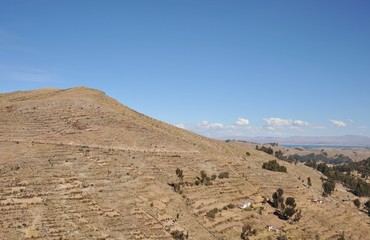 Surroundings mountain lake Titicaca. Bolivia