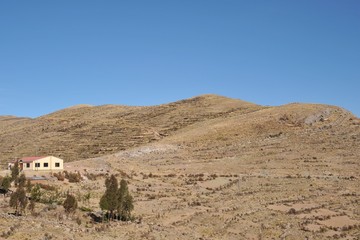 Surroundings mountain lake Titicaca. Bolivia