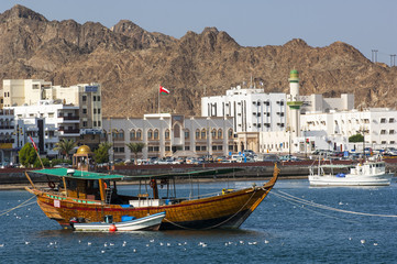 A tourist boat moored in the harbour of Muscat, Oman