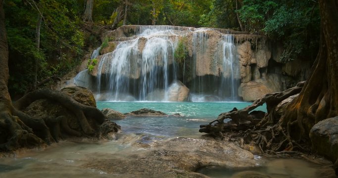 Idyllic peaceful background of beautiful waterfall cascade in Erawan park