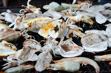 Grilled and calamari prawns on Stove Thai Style for at Seafood