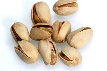 Pistachios isolated on white background