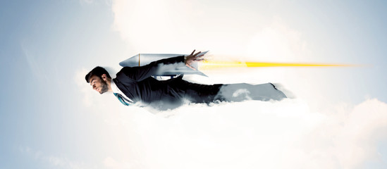 Business man flying like a superhero in clouds on the sky