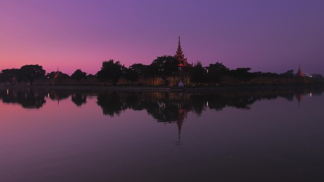 Mandalay, Myanmar (Burma) - ancient fort and Royal Palace at late evening sunset