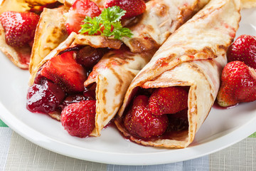 Traditional crepes served with strawberries