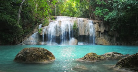 Scenic waterfall in Thailand tropical forest. Beautiful nature loopable seamless - Powered by Adobe