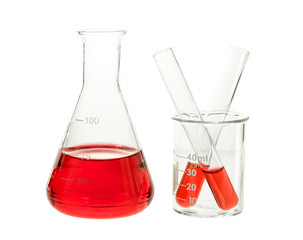 red solution in flask and test tube