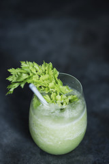 green vegetables juice glass with kale and celery