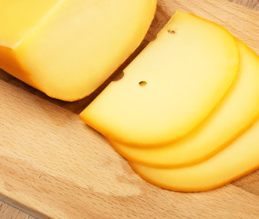 cheese slices on cutting board