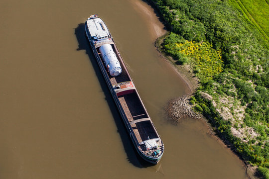 Aerial View Of A River Barge