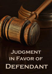 Judgment in favor of Defendant - gavel over black