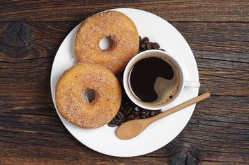 Plate with donuts and coffee