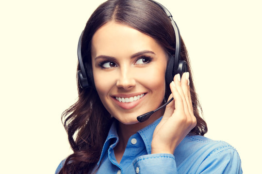 Portrait of happy smiling customer support phone operator