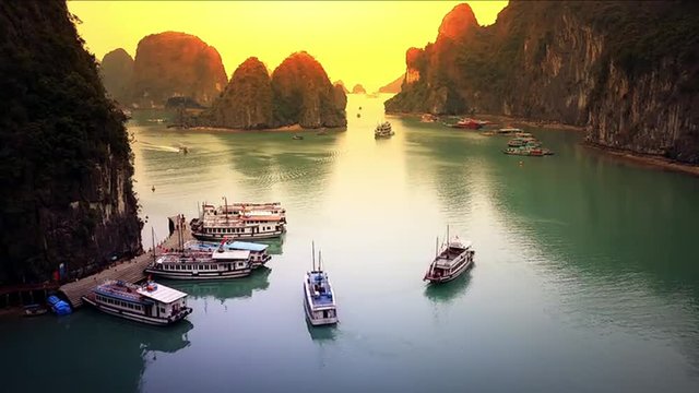 Halong Bay Vietnam panoramic view landscape timelapse. Sunset panorama with boat