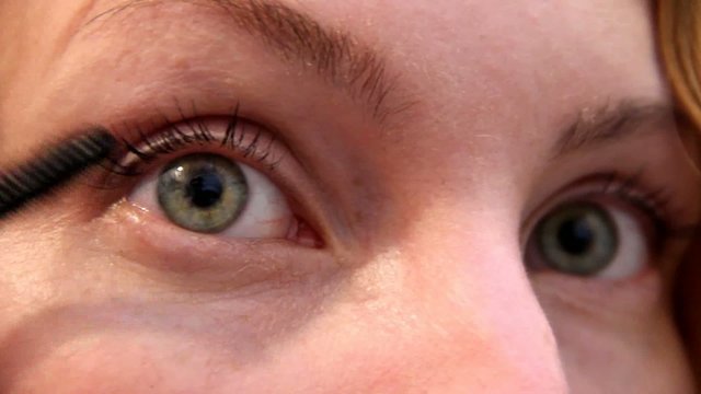 Girl mascara eye colors close up