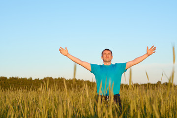 In the field of wheat is a young man