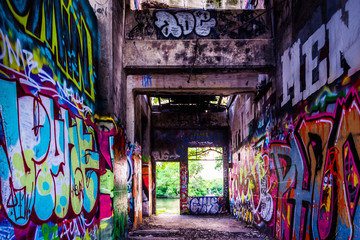 Fototapeta na wymiar Graffiti under an abandoned pier in Philadelphia, Pennsylvania.
