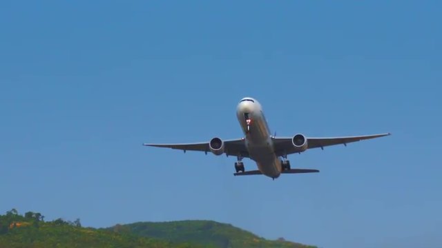 Airplane takeoff from runway landing strip of airport. Passenger jet departure