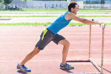 Obraz premium Young man doing sport exercises 
