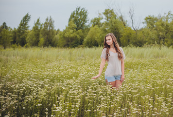 Candid skipping carefree adorable woman in field 