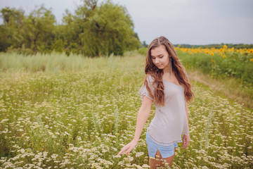 Candid skipping carefree adorable woman in field 