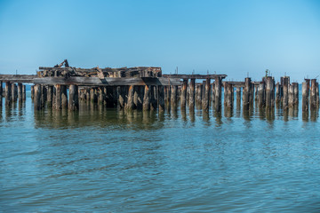 Fototapeta na wymiar Decayed Pier Pilings