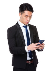 Young businessman check the email on cellphone