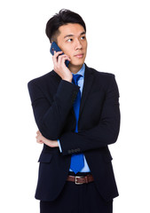 Young businessman talk to mobile phone