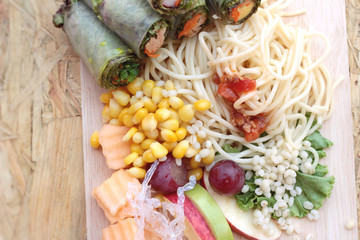 Pasta spaghetti with salad mix fruit and vegetables