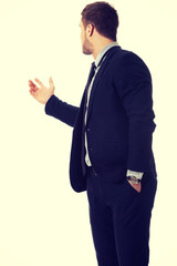 Businessman showing copy space.