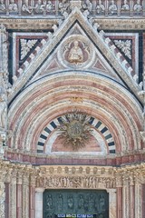 Detail of facade of Siena Cathedral (Duomo di Siena), Siena, Italy