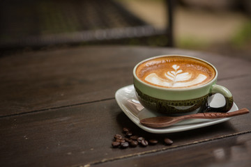Latte Art coffee with coffee bean