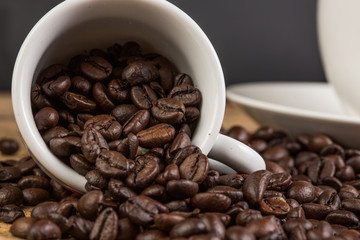 Coffee bean on grunge wooden background