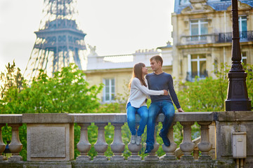 Romantic loving couple near the Eiffel tower