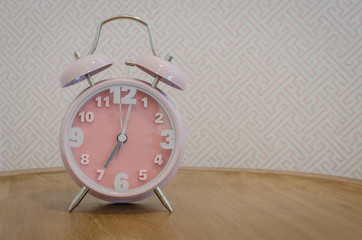 classic pink alarm clock