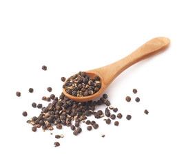 Wooden spoon and black peppercorn