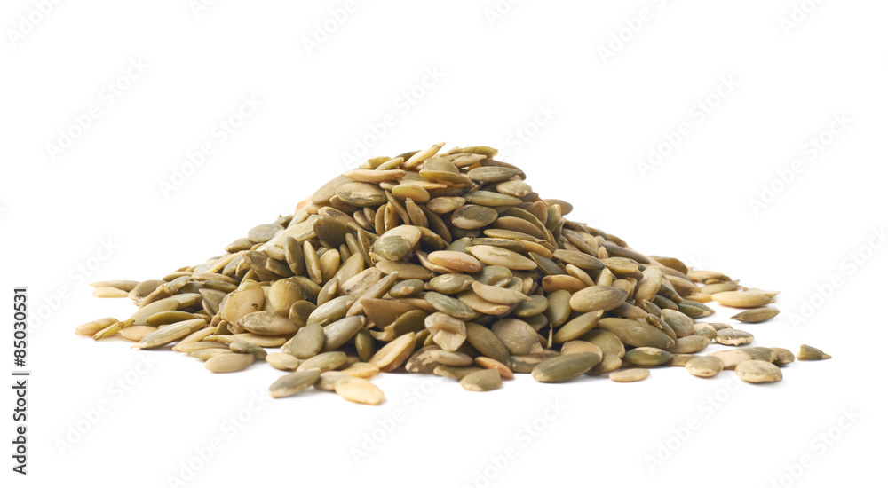 Wall mural pile of pumpkin seeds isolated