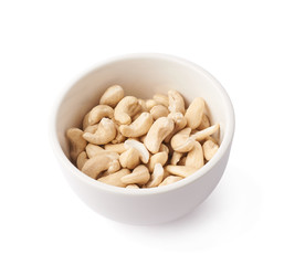 Bowl filled with cashew nuts isolated