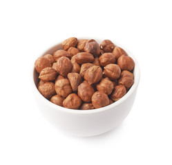 Cup filled with the hazelnuts isolated