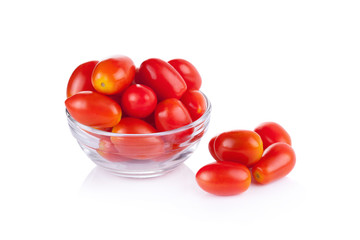 tomato in the glass on white background
