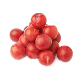Pile of multiple red plums isolated