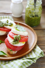 Bruschetta with cheese and pesto